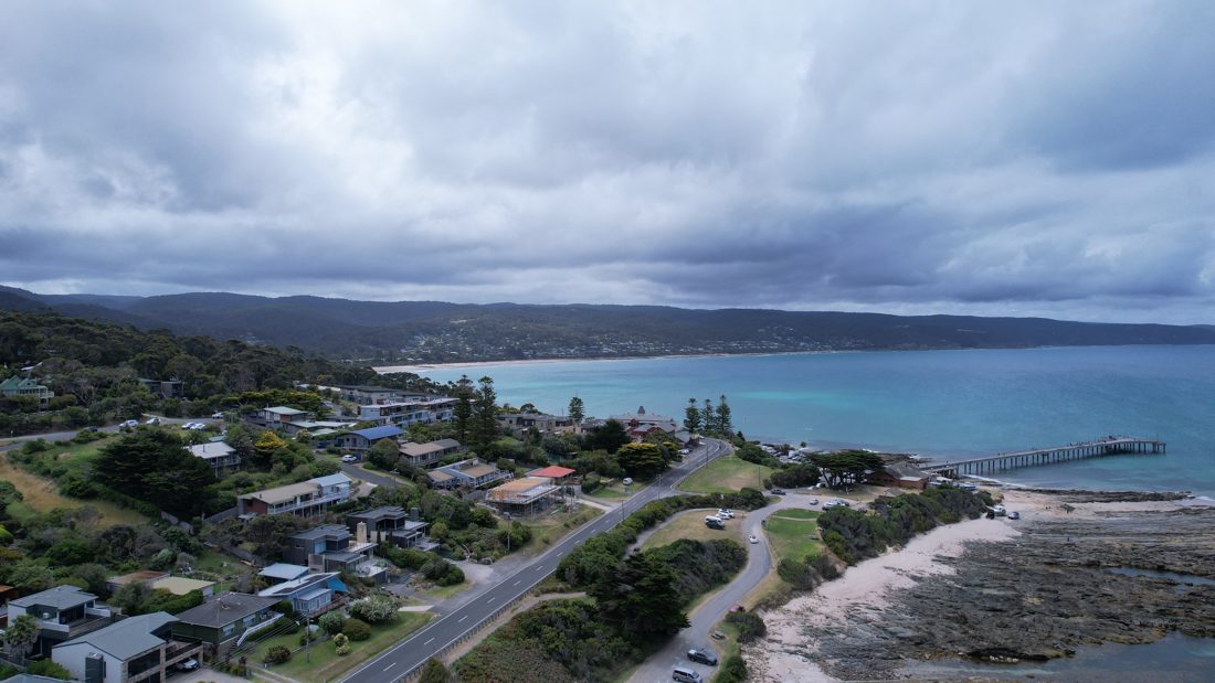 Aerial beach houses and pier