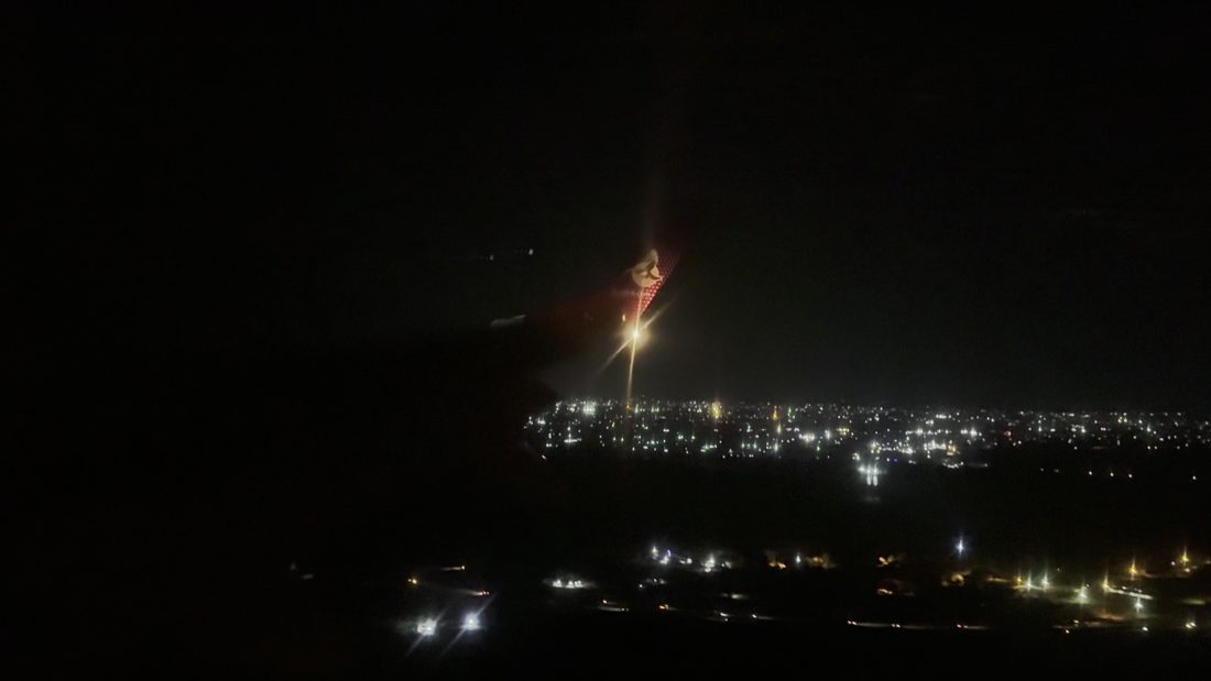 Lit tower over the city